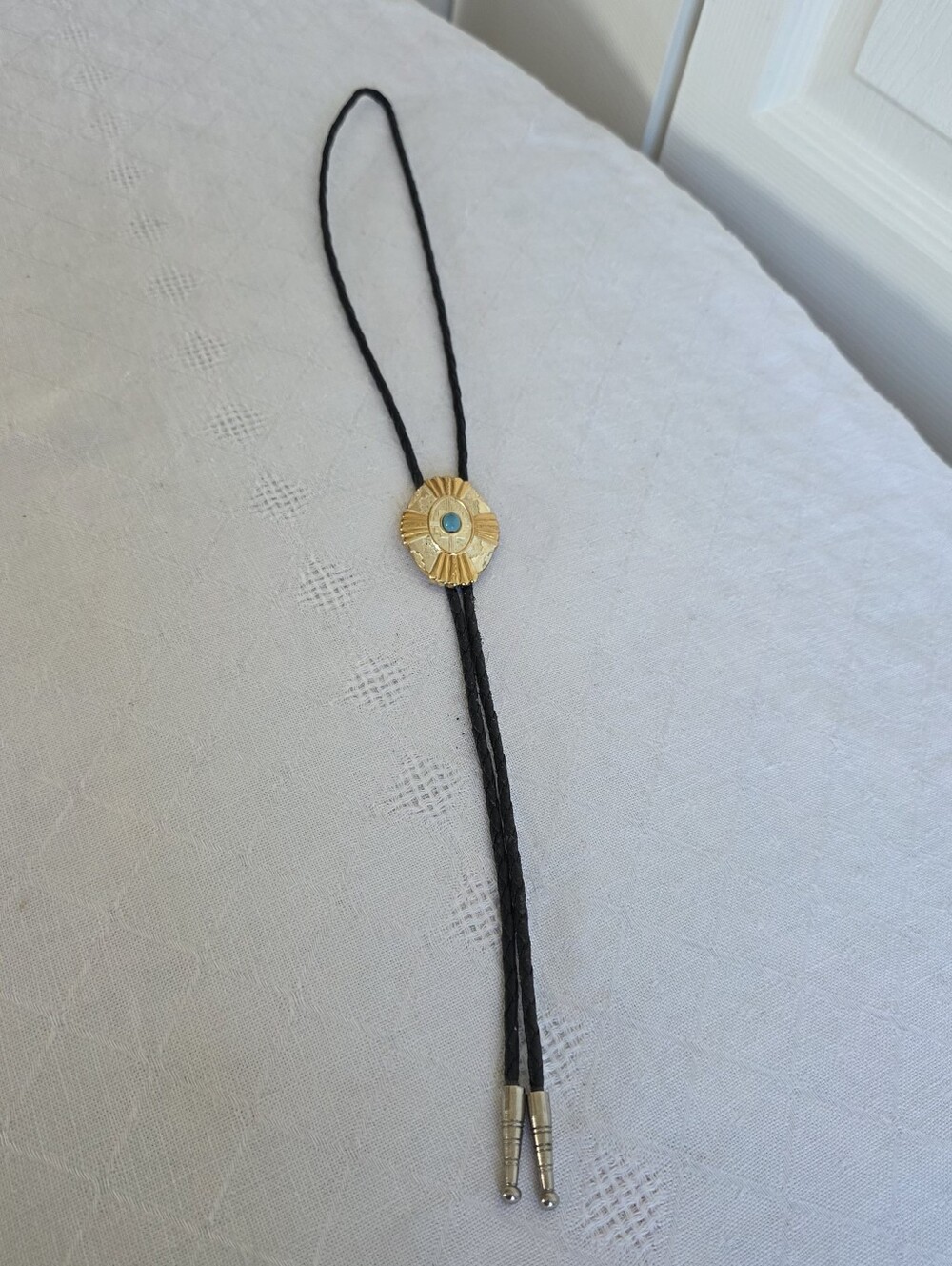 Gold Medallion Bolo Necklace with Turquoise Accent on Black Cord